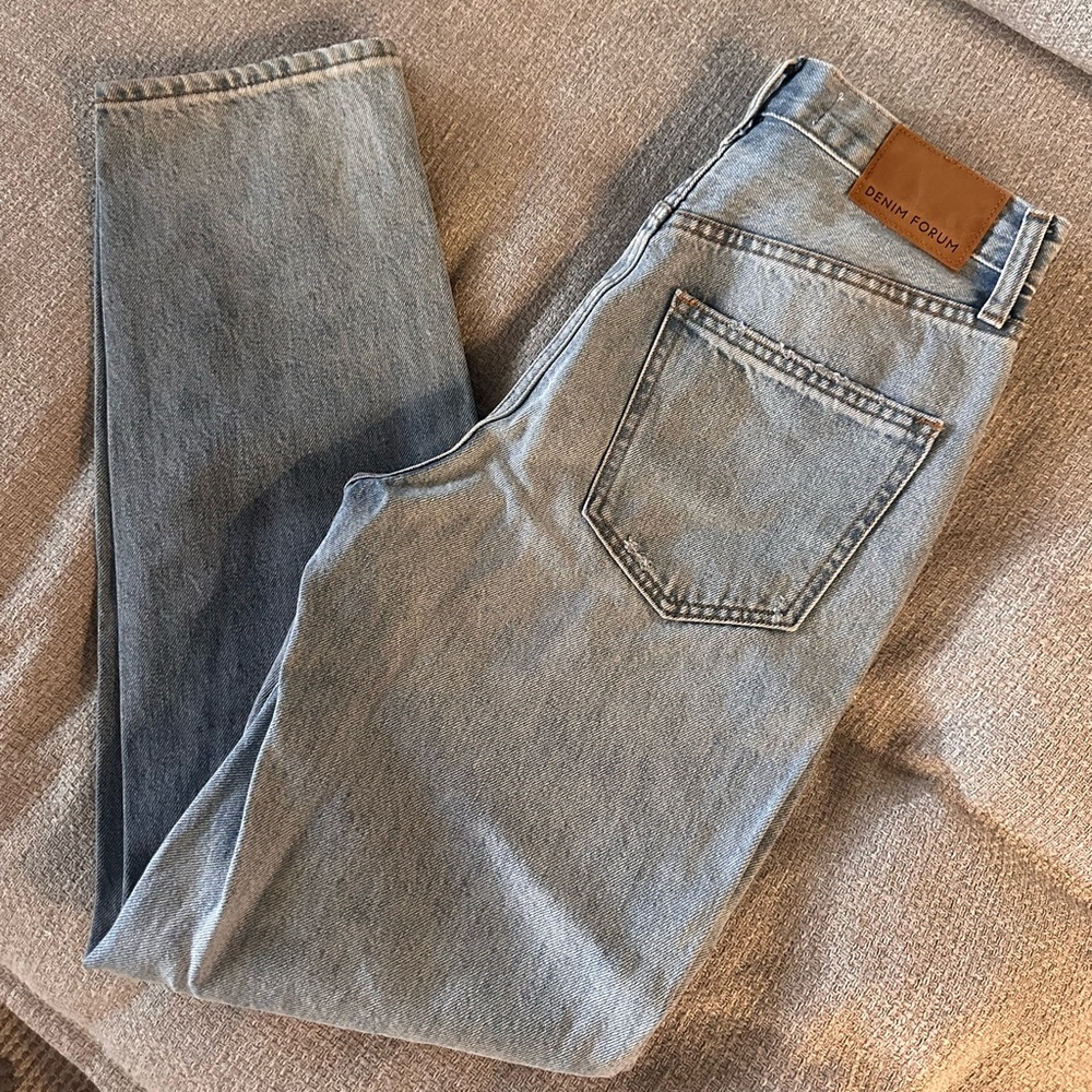 Denim Forum, distressed light blue jeans
